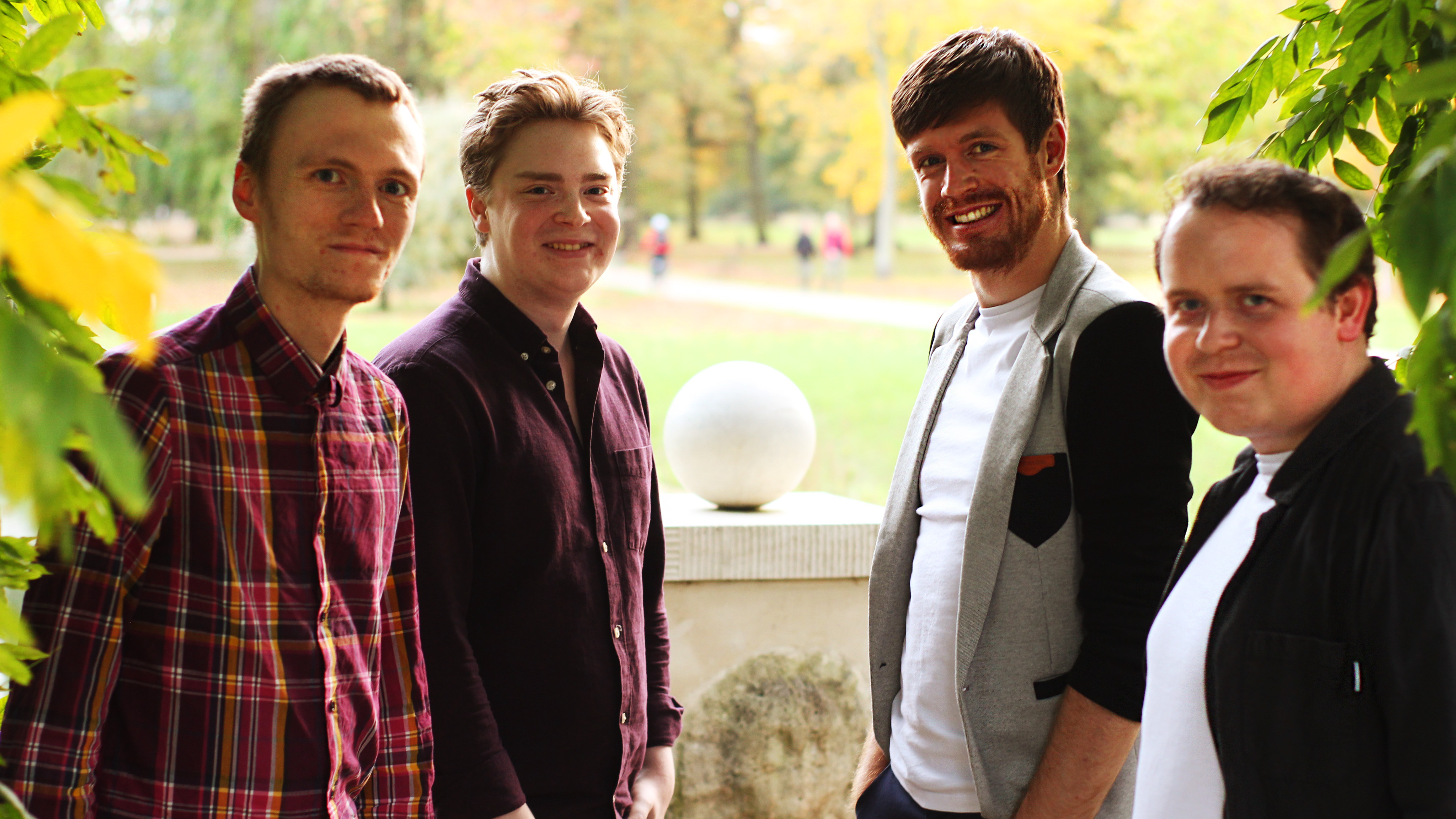 On That Note quartet standing together in an autumn park